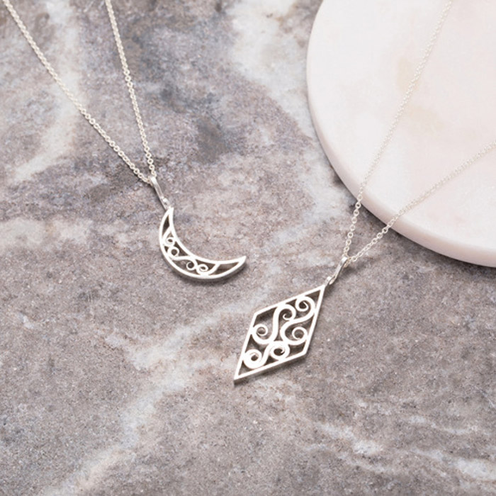 scroll shape silver necklace.